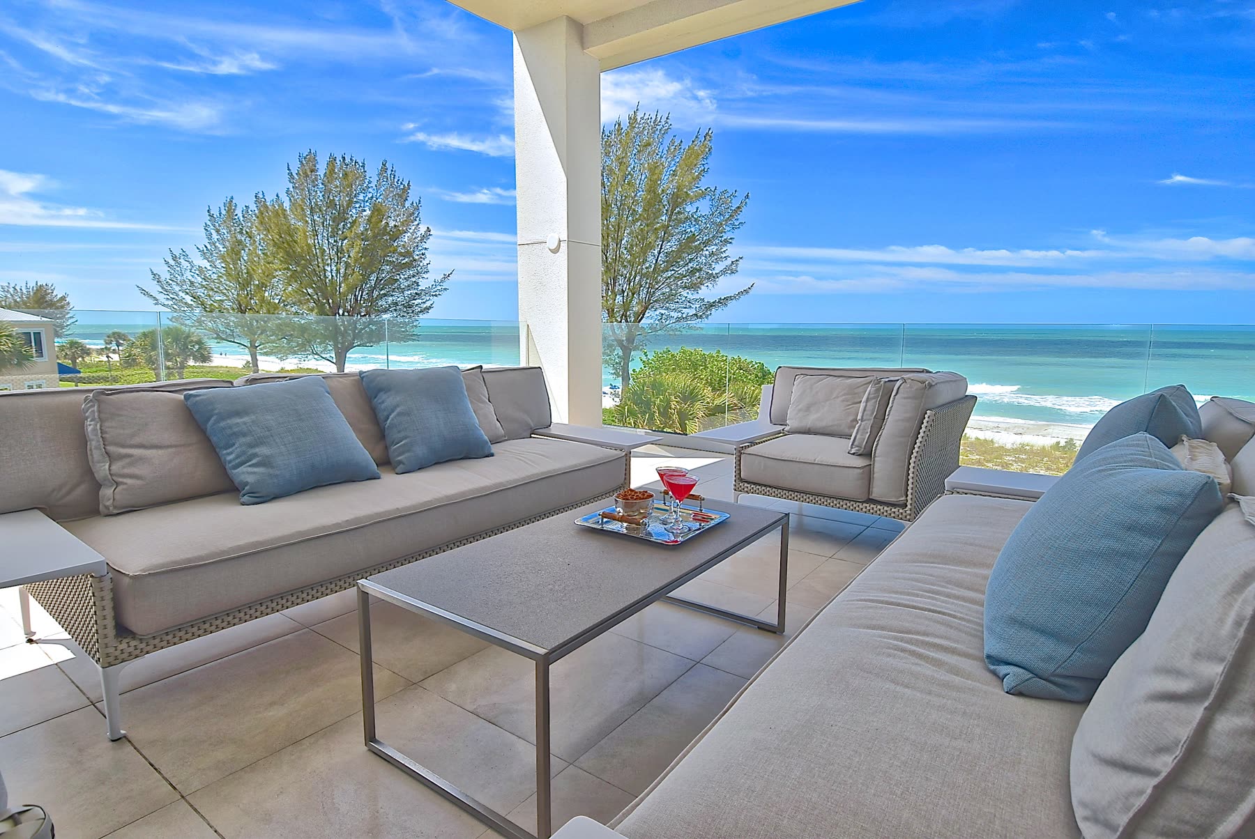Terrace, looking along the sand. Residence by M2Develop