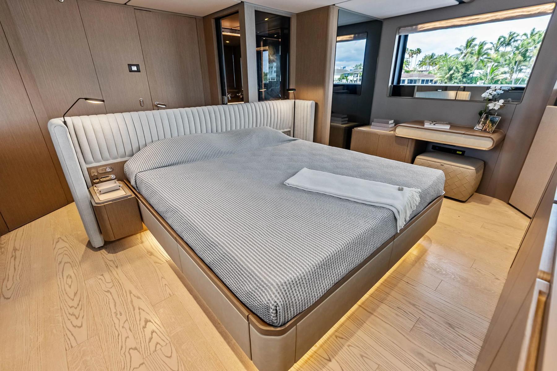 Owner's stateroom, oak bulkhead. Yacht interior by M2Develop, Fort Lauderdale