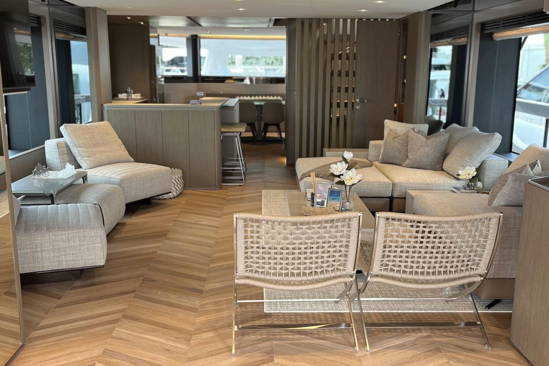 Salon, woven chairs. Yacht interior by M2Develop, Fort Lauderdale