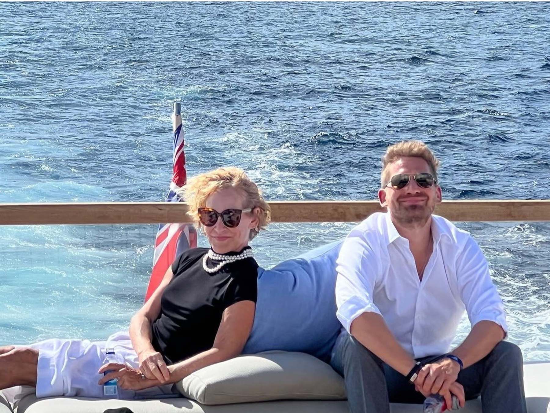 Ryan Altman and Marty Lowe on an aft deck, under way.